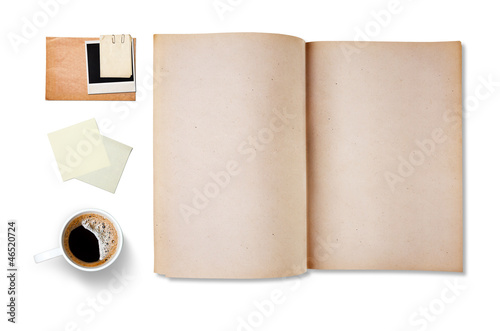 Photo: Workspace with coffee cup, note paper and notebook, isolated on Workspace with coffee cup, note paper and notebook, isolated on