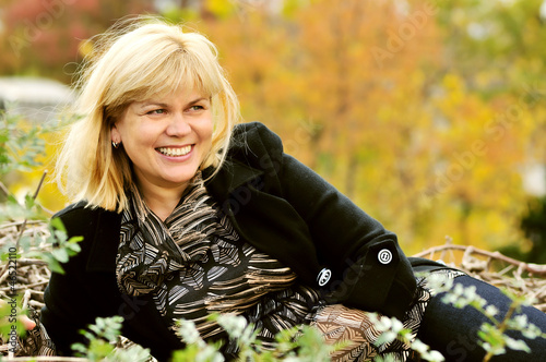 Photo: middle age woman in fall time middle age woman in fall time