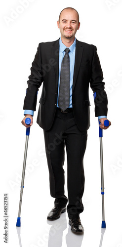 Photo: businessman with crutch businessman with crutch