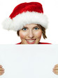 Women with santa hat presenting white message board