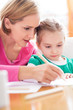 Photo: Mother and daughter drawing Mother and daughter drawing