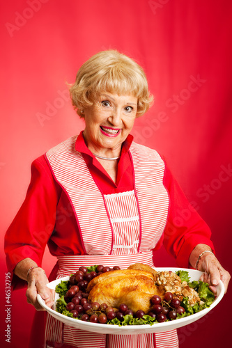 Photo: Retro Housewife Cooks Holiday Meal Retro Housewife Cooks Holiday Meal