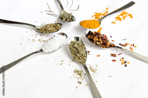 Photo: Spices and herbs on white background Spices and herbs on white background