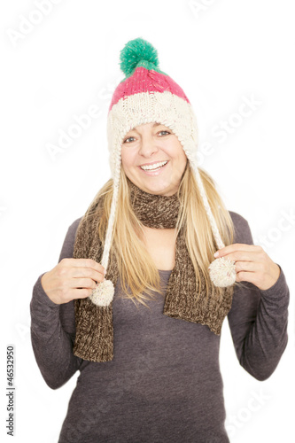 Photo: Glückliche Dame trägt eine Mütze Glückliche Dame trägt eine Mütze
