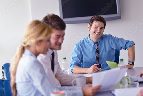 Photo: business people in a meeting at office business people in a meeting at office
