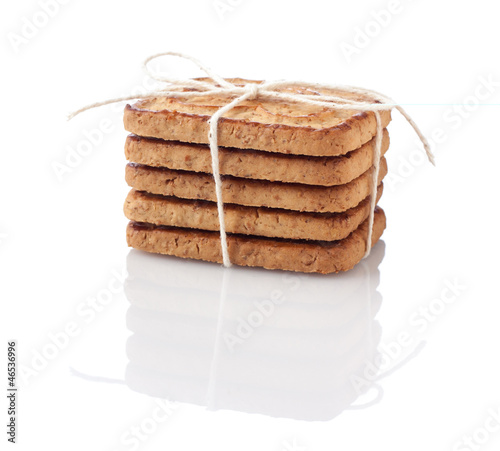 Photo: Stack of cookies tied with thread Stack of cookies tied with thread