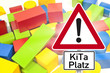 Holzbauklötze mit Schild KiTa-Platz
