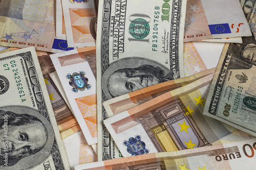 Photo: Background from dollar and euro Background from dollar and euro