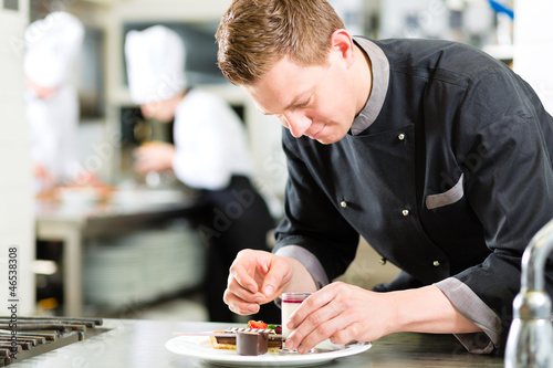 Photo: Chef as Patissier cooking in Restaurant dessert Chef as Patissier cooking in Restaurant dessert