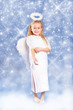 Christmas angel with sparkling stars on a cloud