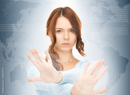 Photo: businesswoman working with touch screen businesswoman working with touch screen