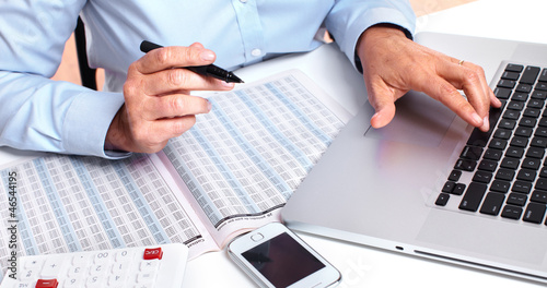 Photo: Hands of accountant business woman. Hands of accountant business woman.