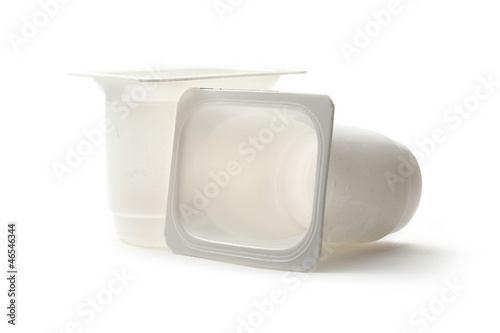 Photo: Empty plastic yoghurt pots on white Empty plastic yoghurt pots on white