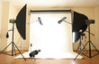 Empty photo studio with lighting equipment
