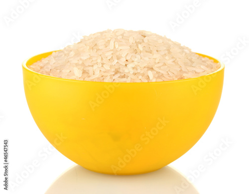 Photo: rice in a yellow plate , isolated on white rice in a yellow plate , isolated on white