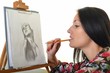 beautiful young woman painting