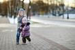 Photo: Two sisters having fun at winter city Two sisters having fun at winter city