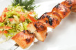 Photo: barbecue with sauce and vegetables barbecue with sauce and vegetables
