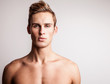 Attractive young undressed man model. Attractive young undressed man model.