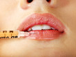 Photo: Woman giving botox injections. Woman giving botox injections.
