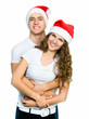 Beautiful Christmas couple in Santa hats
