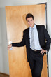 Young Businessman Standing With Hand On Hip