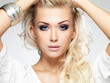 Beautiful blond woman with saturated makeup.