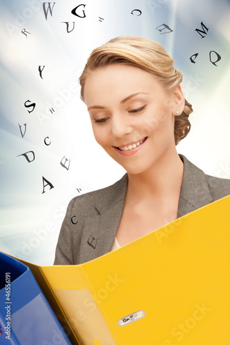 Photo: woman with folders woman with folders