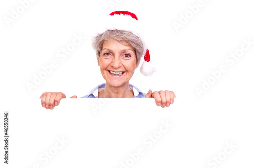 Photo: rentnerin mit weihnachtsmütze rentnerin mit weihnachtsmütze