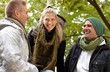 Photo: Happy people in park laughing Happy people in park laughing