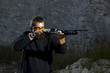Man shooting  on an outdoor shooting range
