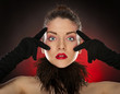 Head shot of sexy pinup model wearing  gloves