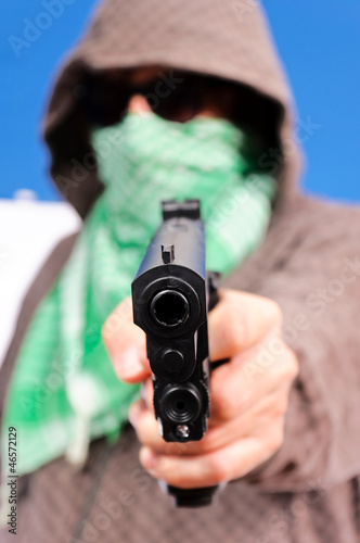 Photo: Gun in the hand Gun in the hand