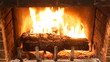 Burning wood in stone fireplace