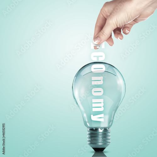 Photo: Business term and electric bulb Business term and electric bulb