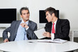 Businessmen Using Digital Tablet At Desk