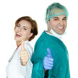 Foto: Young students for medicine having thumbs up Young students for medicine having thumbs up