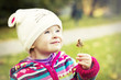 Photo: Sweet baby girl holding a leaf Sweet baby girl holding a leaf