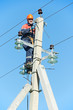 power electrician lineman at work on pole