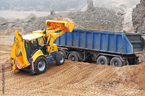 Photo: Excavator Loader at earth moving works Excavator Loader at earth moving works