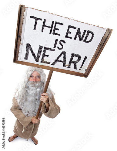 Photo: visionary with a sign of the end is near visionary with a sign of the end is near