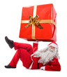 Santa Claus holding a big gift
