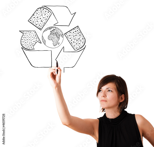 Photo: Young woman drawing recycle globe on whiteboard Young woman drawing recycle globe on whiteboard