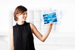 Young woman looking at modern tablet with social icons