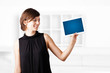 Young woman looking at modern tablet