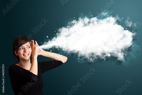 Photo: Young woman with abstract cloud Young woman with abstract cloud