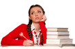 girl sitting in front of books