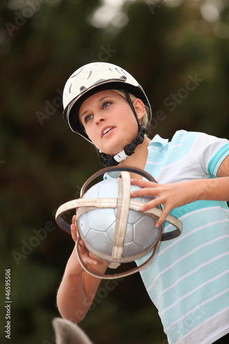Photo: Girl playing Horseball Girl playing Horseball