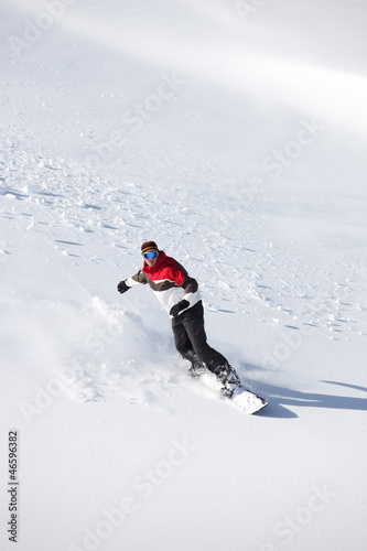 Photo: Man practicing snowboard Man practicing snowboard