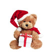 Photo: Cute toy bear with christmas gift on white Cute toy bear with christmas gift on white